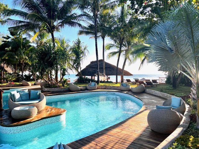Tulia Zanzibar luxury resort with tropical garden and pool